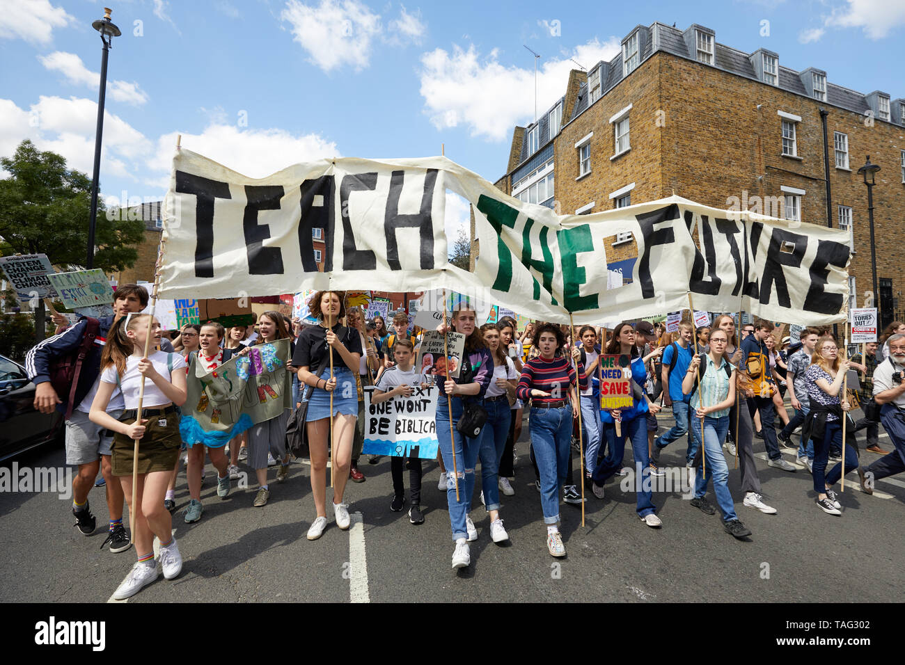 London, U.K. - 24 May, 2019: Young people demonstrate through central London against global warming, part of the Youth Strike 4 Climate movement. Stock Photo