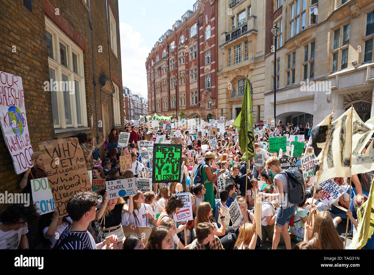 London, U.K. - 24 May, 2019: Young people demonstrate through central London against global warming, part of the Youth Strike 4 Climate movement. Stock Photo