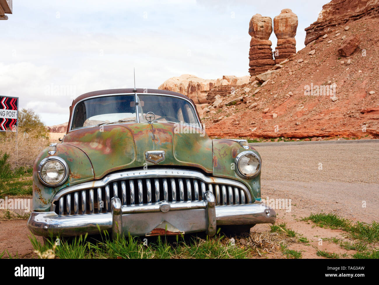 BLUFF, UTAH, USA - APRIL 17, 2013: Old, rusty 1949 Buick Super car parked near the Cow Canyon Trading Post along the U.S. Route 191 with the Bluff Twi Stock Photo