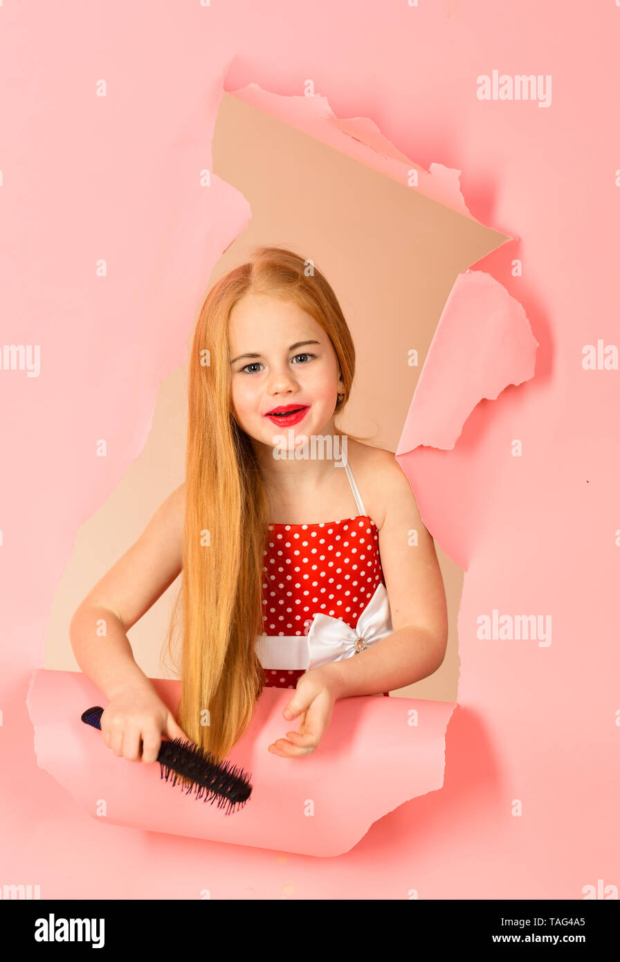 Hair Care And Pinup Style Hair Care Of Small Pin Up Girl Stock