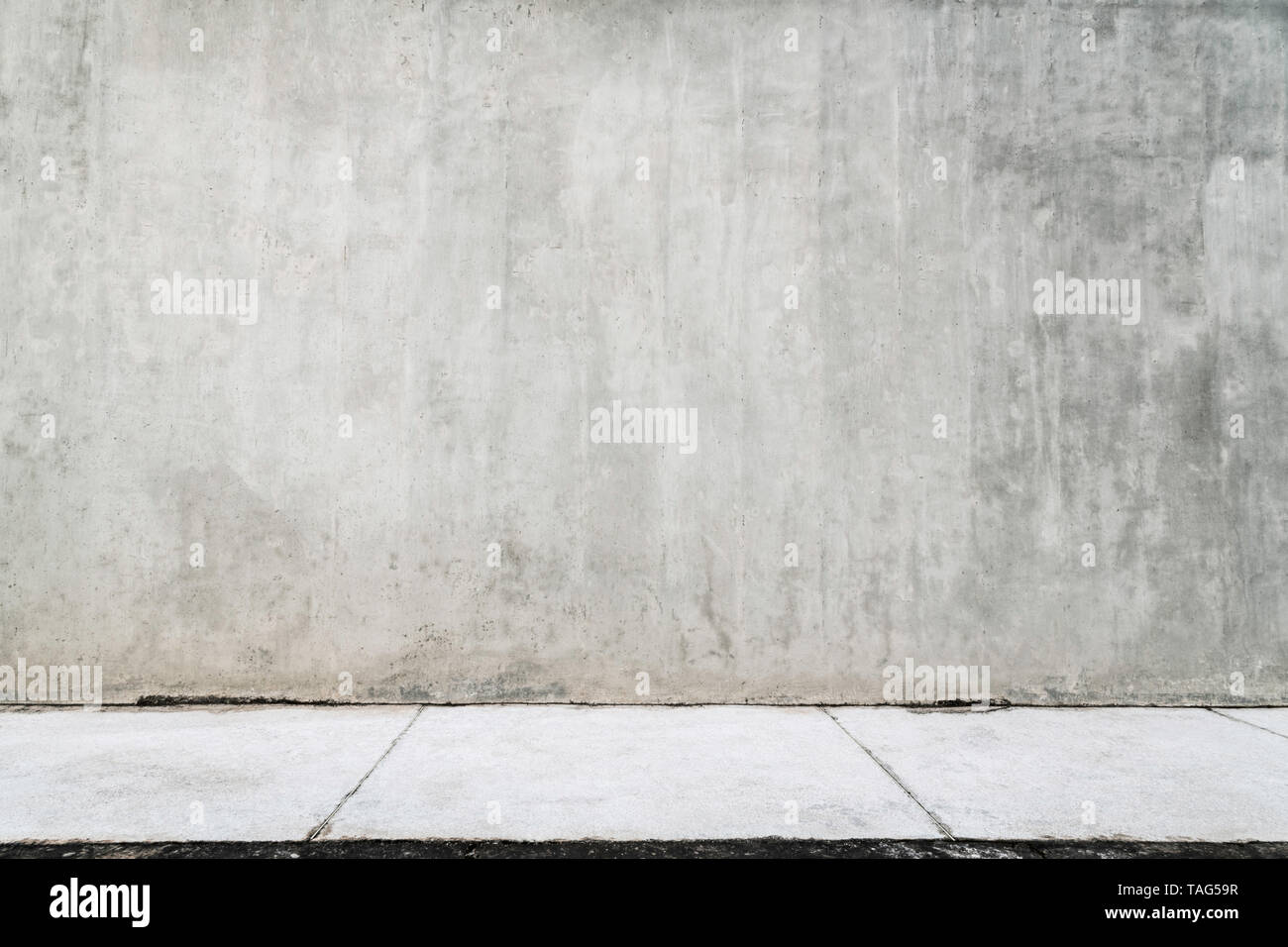 Empty grunge wall with a white path. Stock Photo