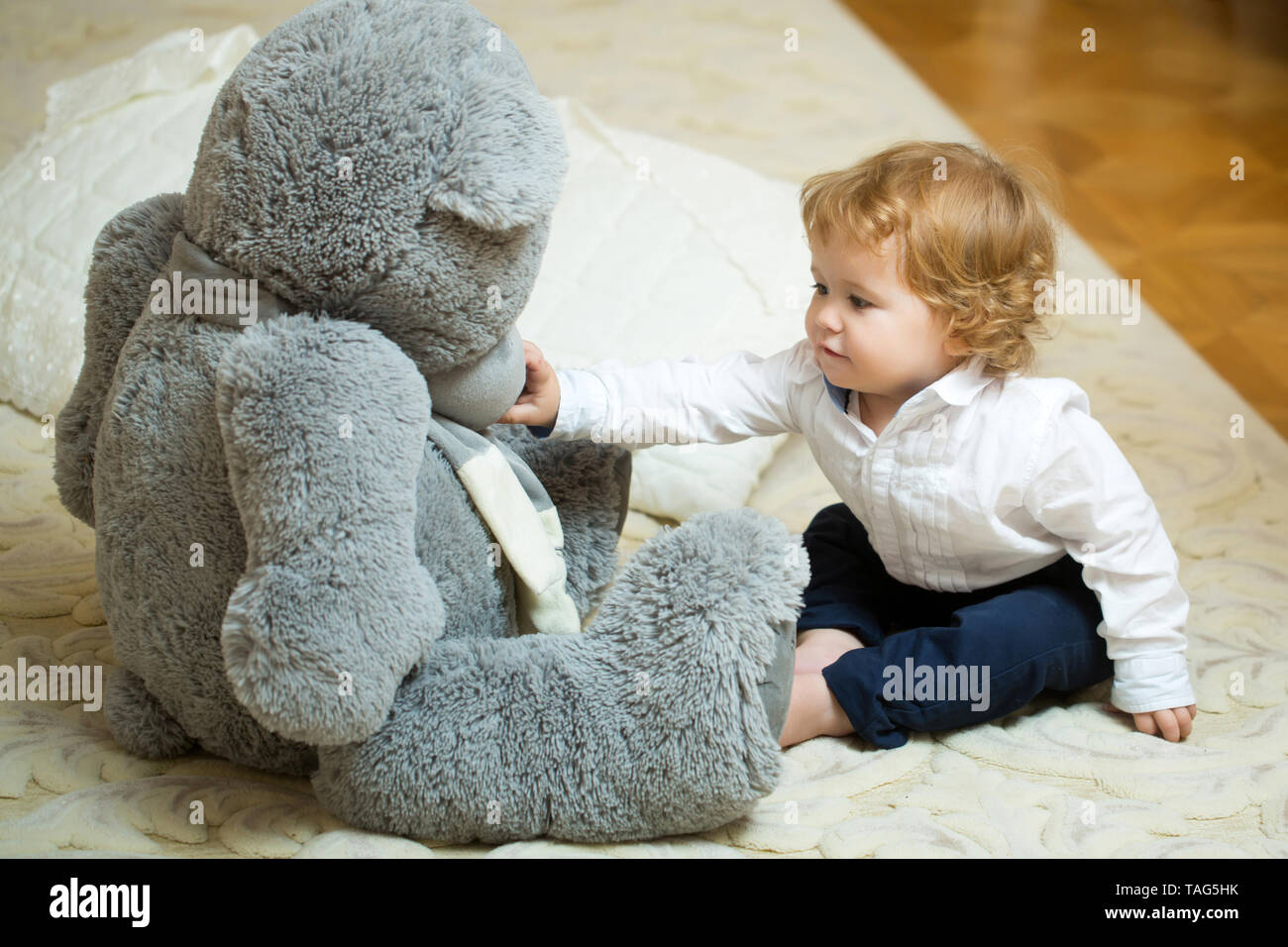 baby and teddy bear