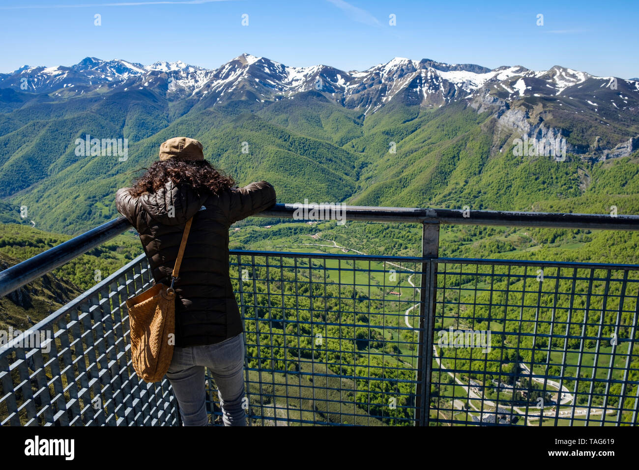 Picos De Europa : Male Cyclist Looking Away While Standing With Bicycle At Picos De Europa National Park Cantabria Spain - Ruta'l quesu y la sidra and la mina de buferrera are local landmarks, and the area's natural beauty can be seen at bay of biscay and cueva el cares.
