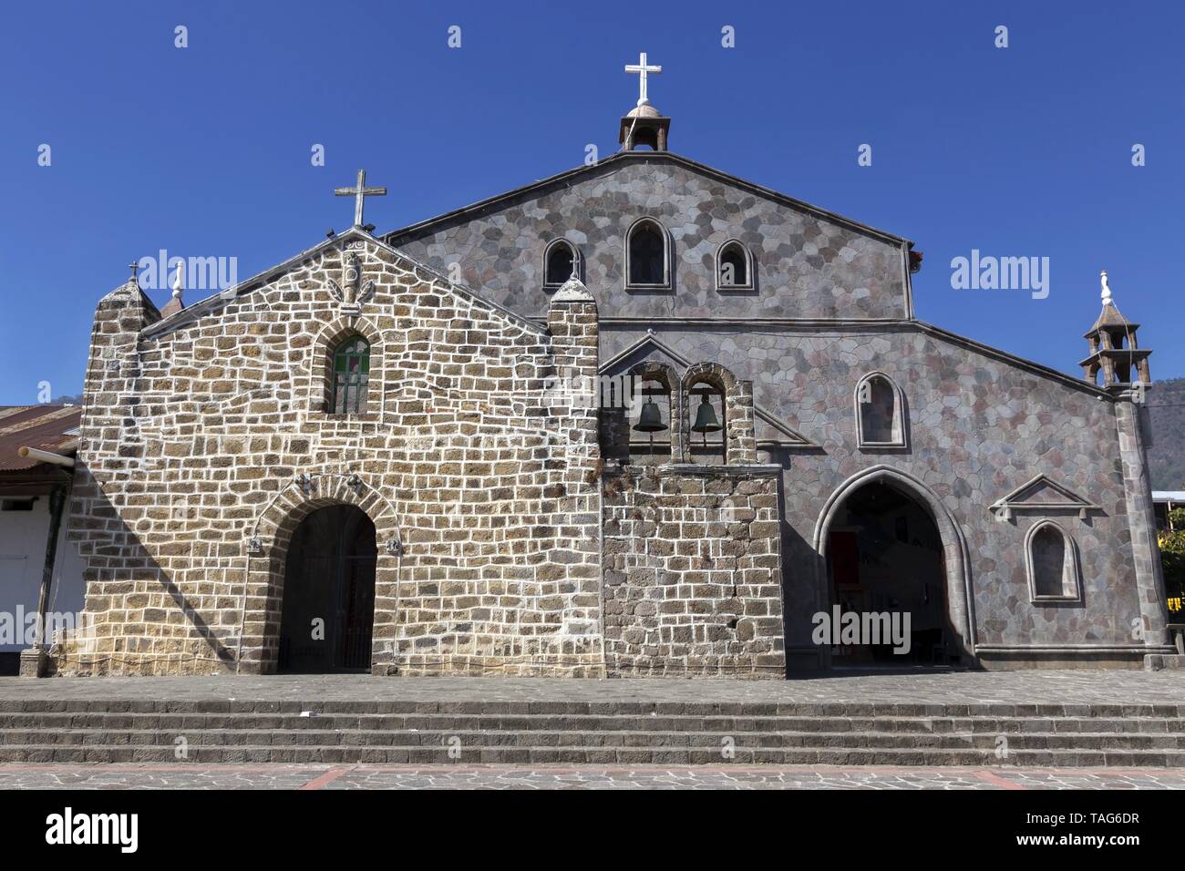 Spanish Catholic Church Building Exterior in San Juan la Laguna Town on Shores of Lake Atitlan in Guatemala Highlands Stock Photo