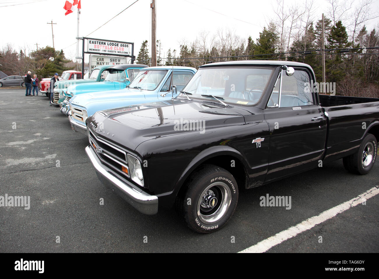 May 11, 2019- Eastern Passage, Nova Scotia: A row of antique trucks including a Chevrolet and Pontiac International at a car show Stock Photo