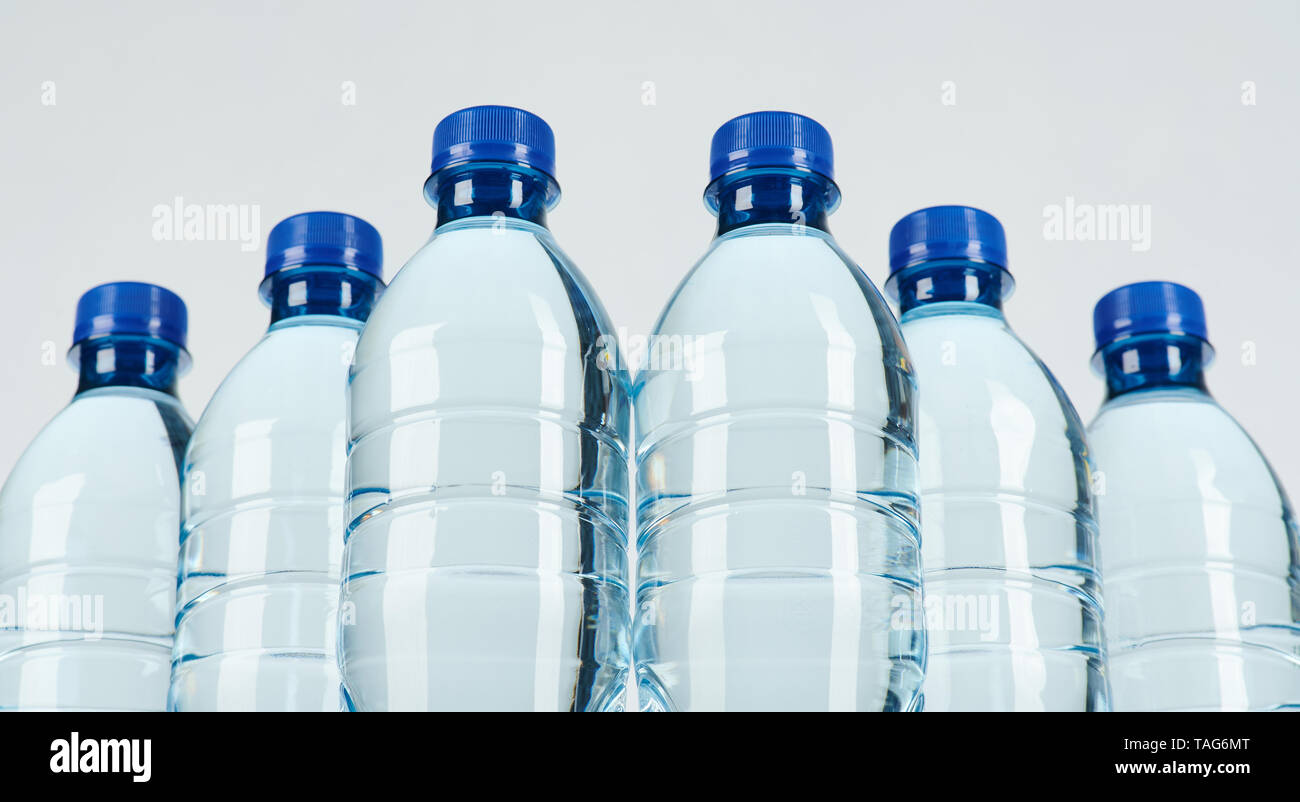 Transparent plastic bottles neck isolated on white background Stock Photo