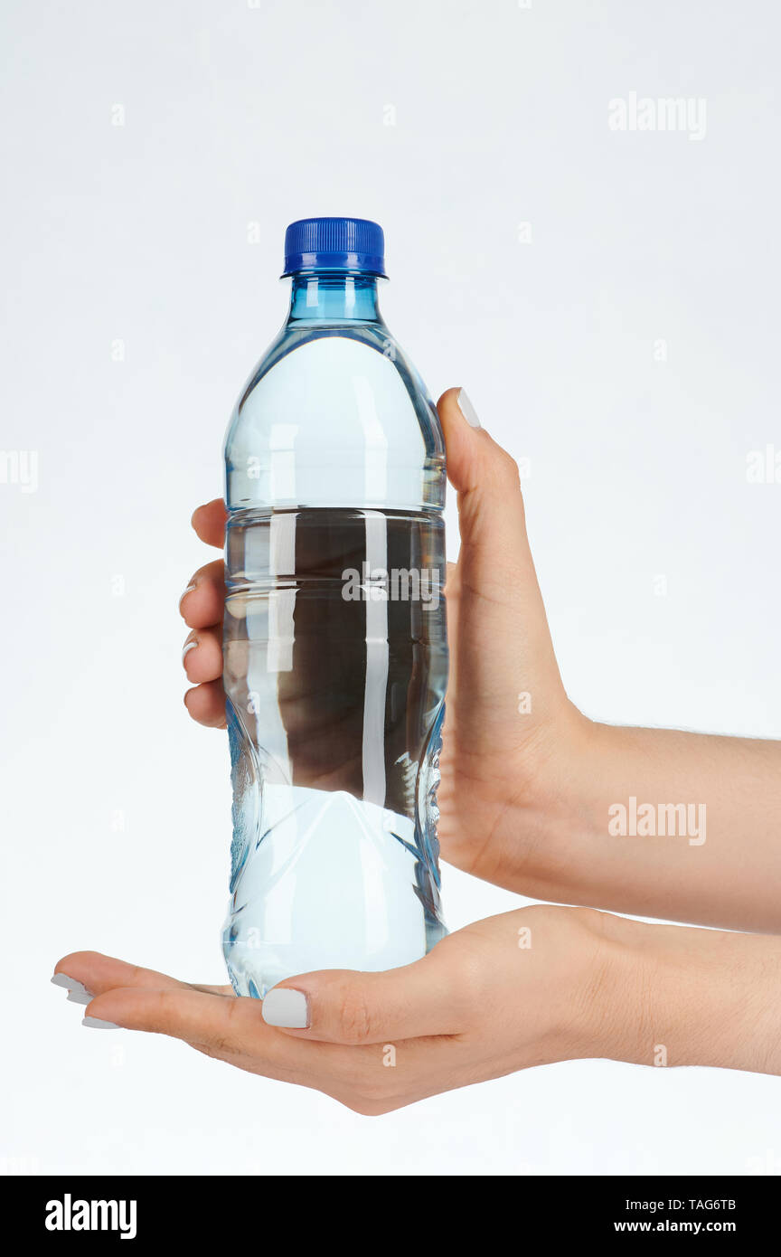https://c8.alamy.com/comp/TAG6TB/woman-hands-hold-clear-water-bottle-isolated-on-white-background-TAG6TB.jpg