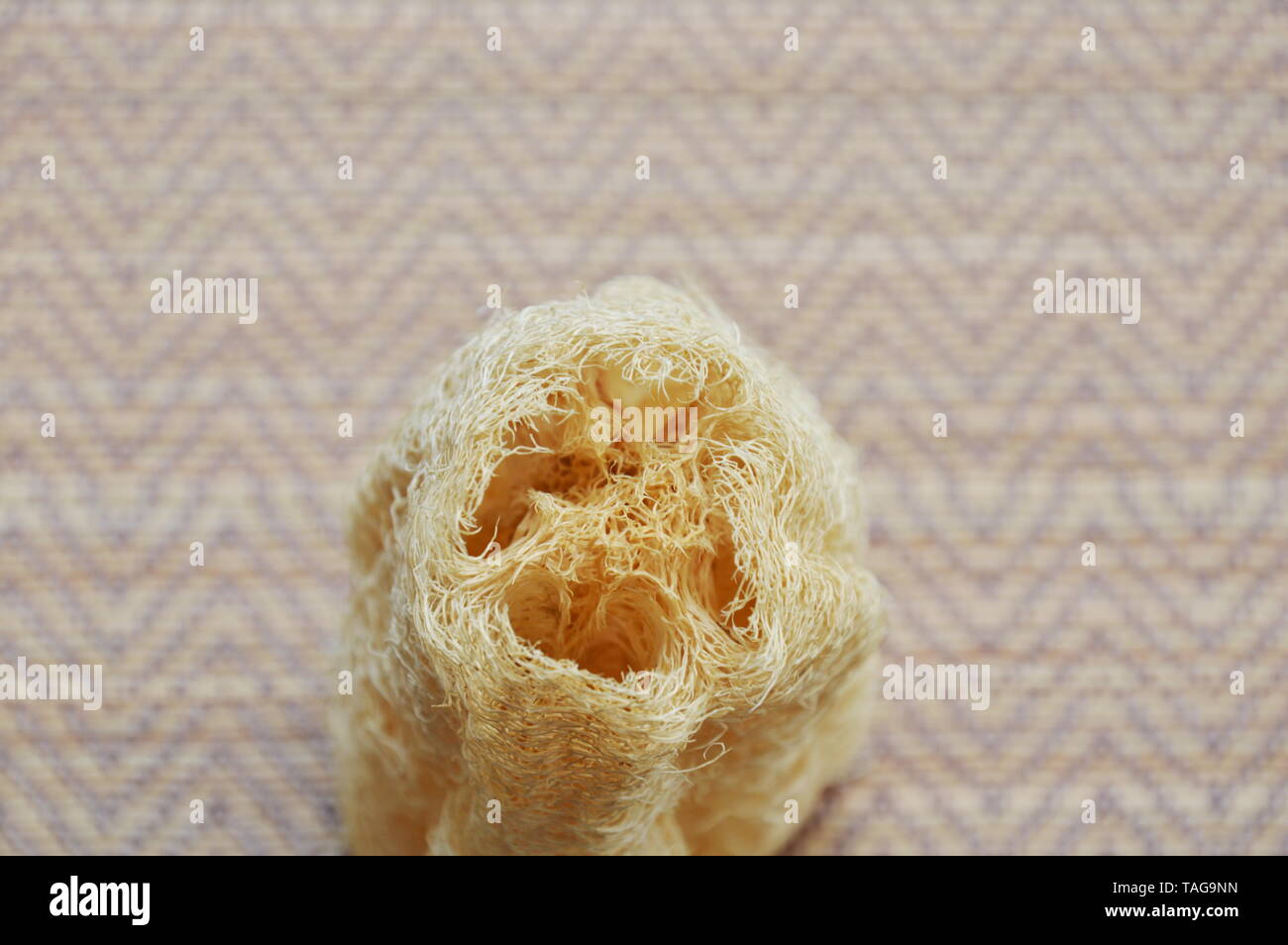 loofah body scrub on bamboo mat Stock Photo Alamy