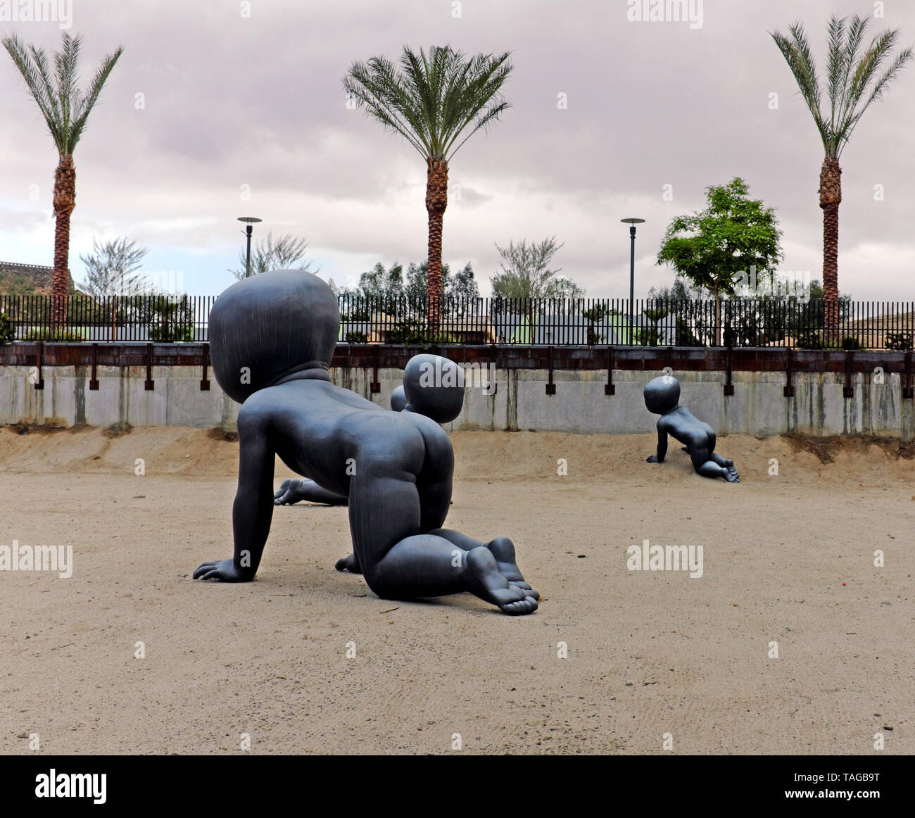 Babies on the Move art installation in downtown Palms Springs, California, by David Cerny represents the dehumanization of society. Stock Photo
