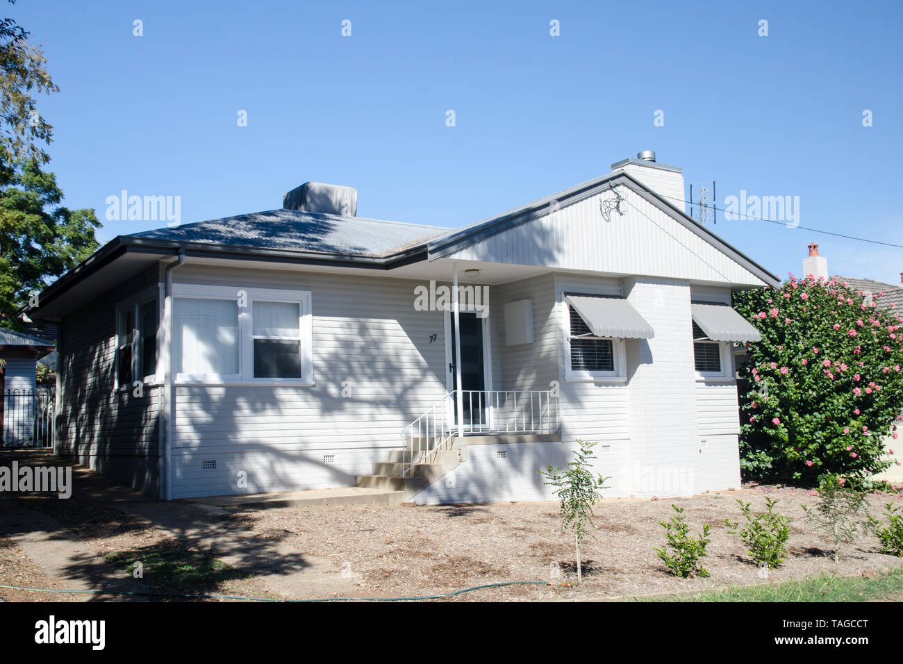 Australian 1940s Double fronted weatherboard bungalow. Stock Photo