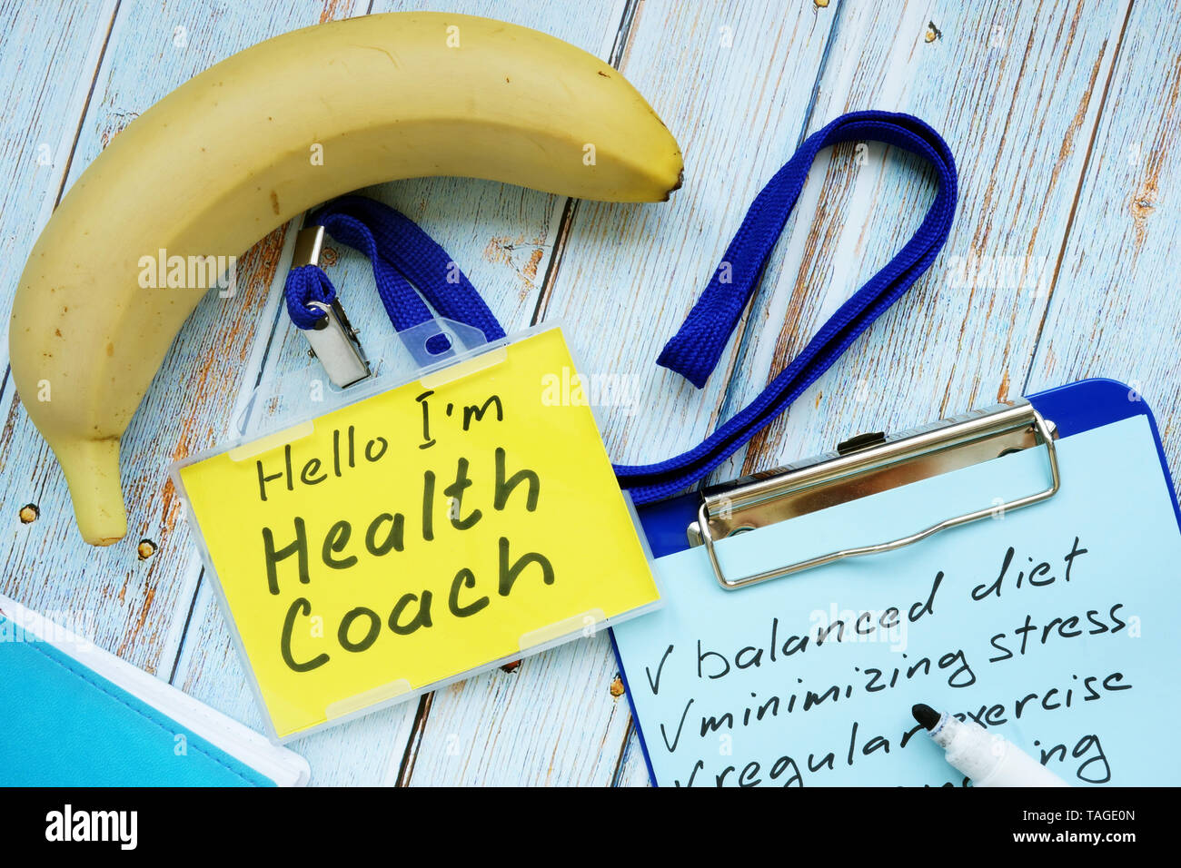 Health coach badge and check list with clipboard Stock Photo Alamy