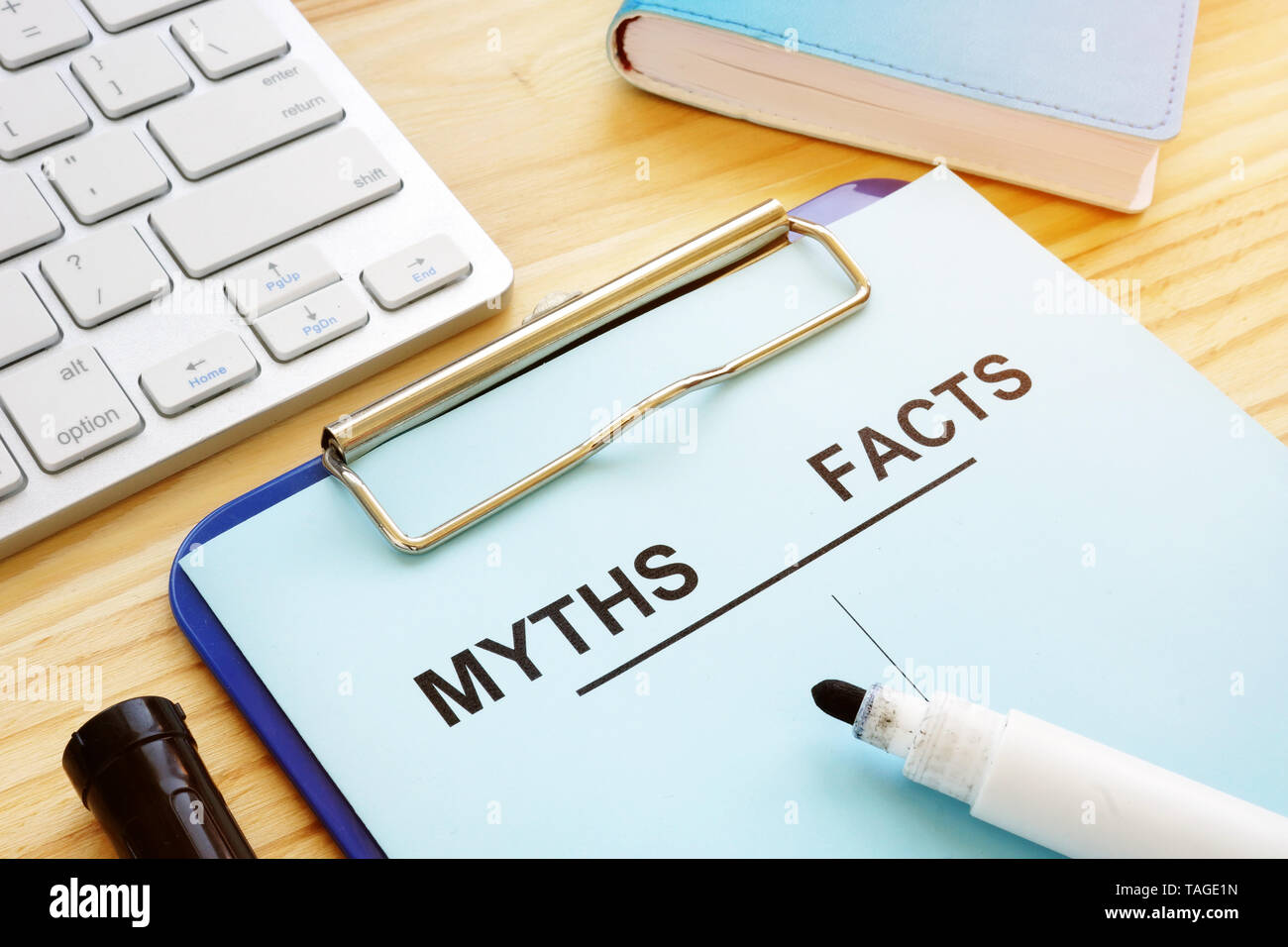 Myths and facts list with pen. Fake news concept. Stock Photo