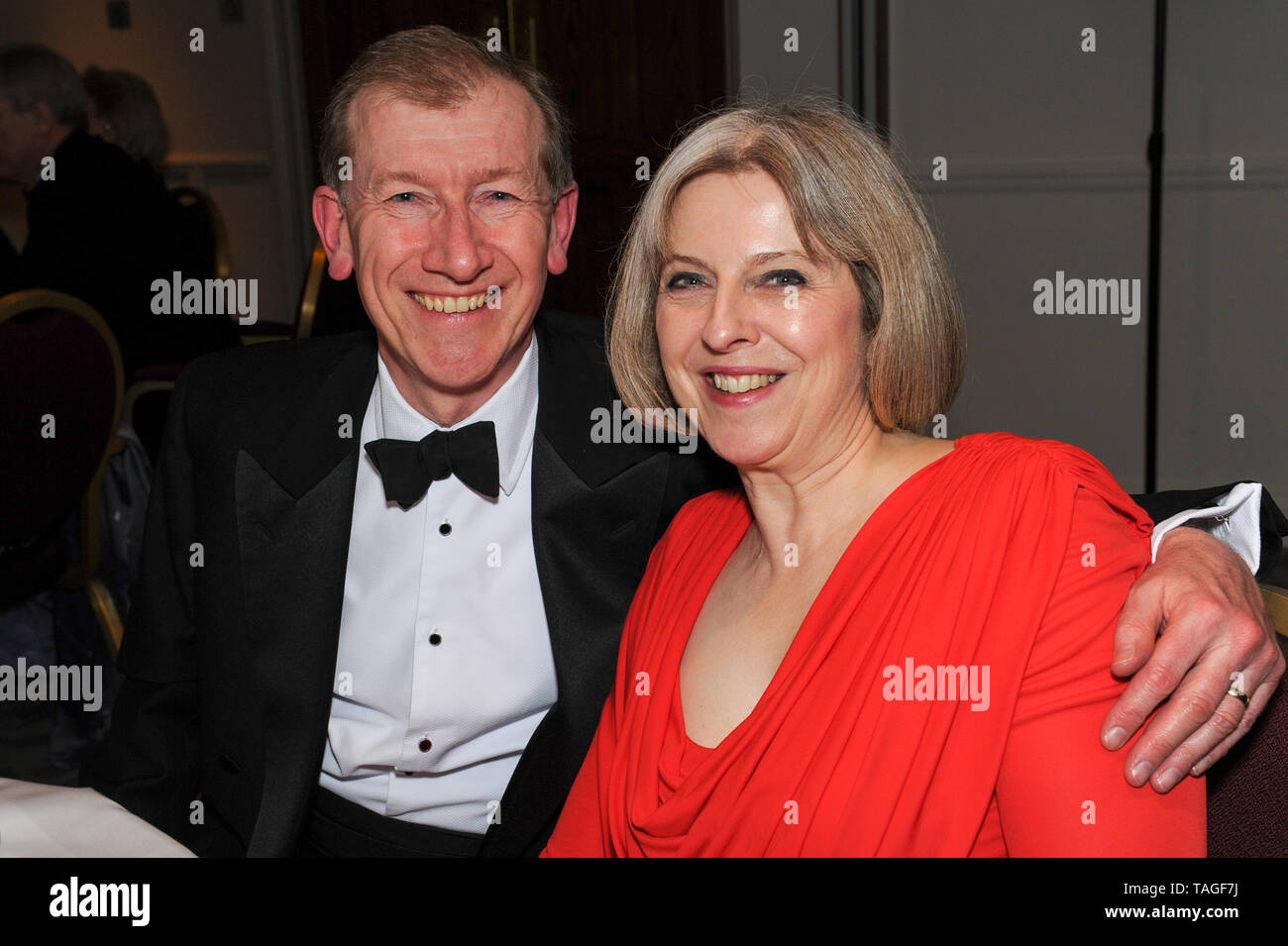 Oakley Court Hotel, Windsor, Berkshire, UK. 25th February, 2012. Home Secretary and Maidenhead MP Theresa May and her husband Philip May attend the annual Maidenhead and District Chamber of Commerce Dinner.  Credit: Maureen McLean/Alamy Stock Photo