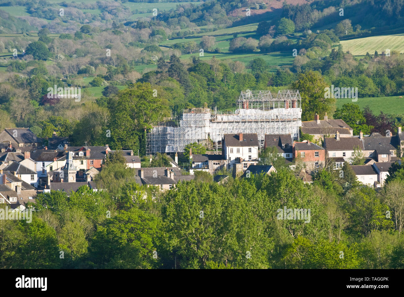 View over the town of Hay on Wye Powys Wales UK Jacobean Hay Castle shrouded in scaffolding during renovation to this historic building funded by a grant of £5m from National Lottery Heritage Fund Stock Photo