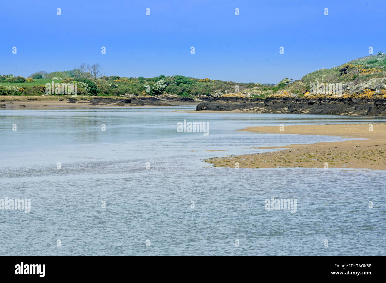 A tidal channel between Holyisland and Anglesey Stock Photo