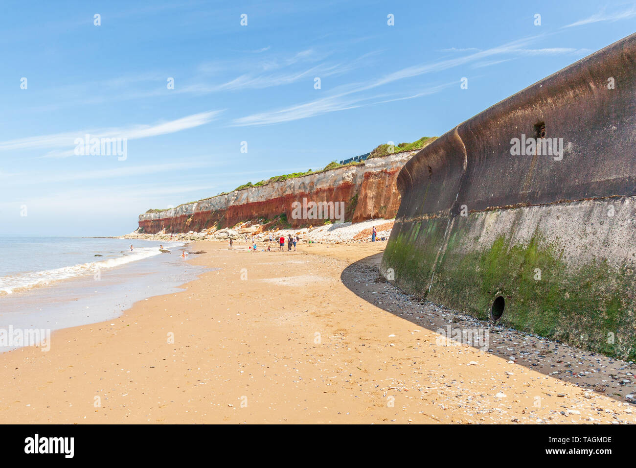 sea wall at hunstanton norfolk with cliffs in background Stock Photo