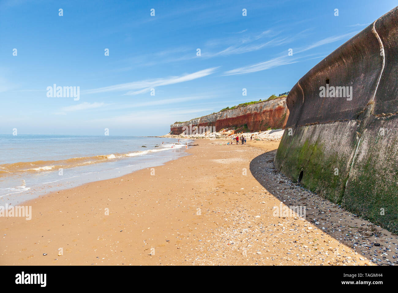 sea wall at hunstanton norfolk with cliffs in background Stock Photo