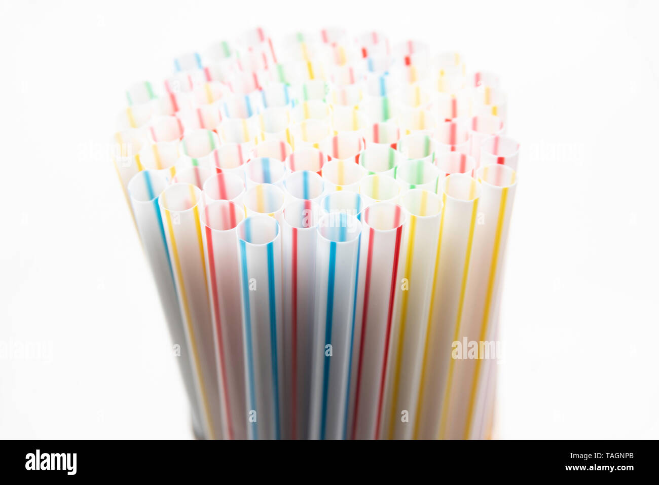 A close-up shot with selective focus of a bunch of unused colored bendy ...