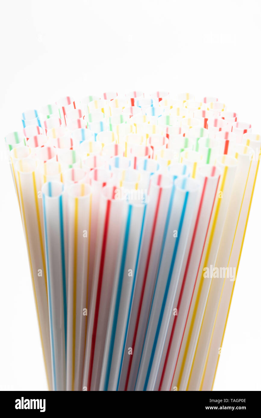 A close-up shot with selective focus of a bunch of unused colored bendy ...