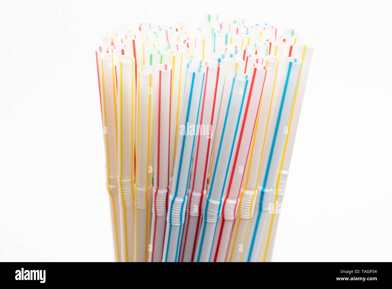 A close-up shot with selective focus of a bunch of unused colored bendy ...