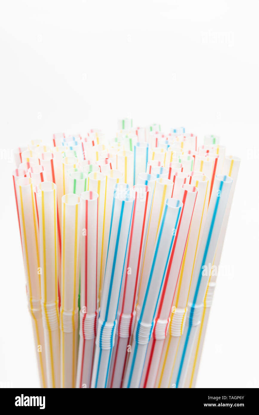 A close-up shot with selective focus of a bunch of unused colored bendy ...