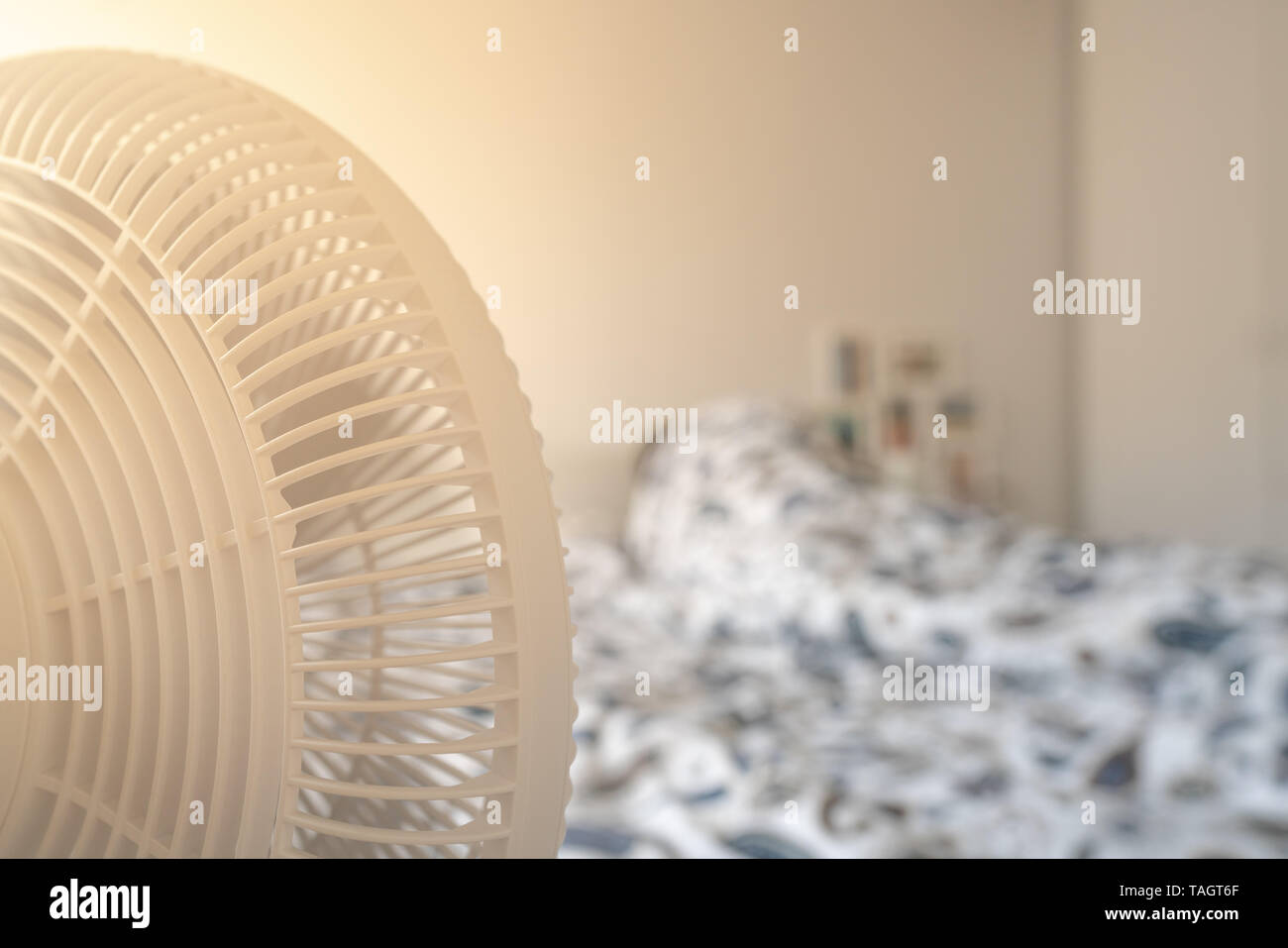 Fan blowing woman bed hires stock photography and images Alamy