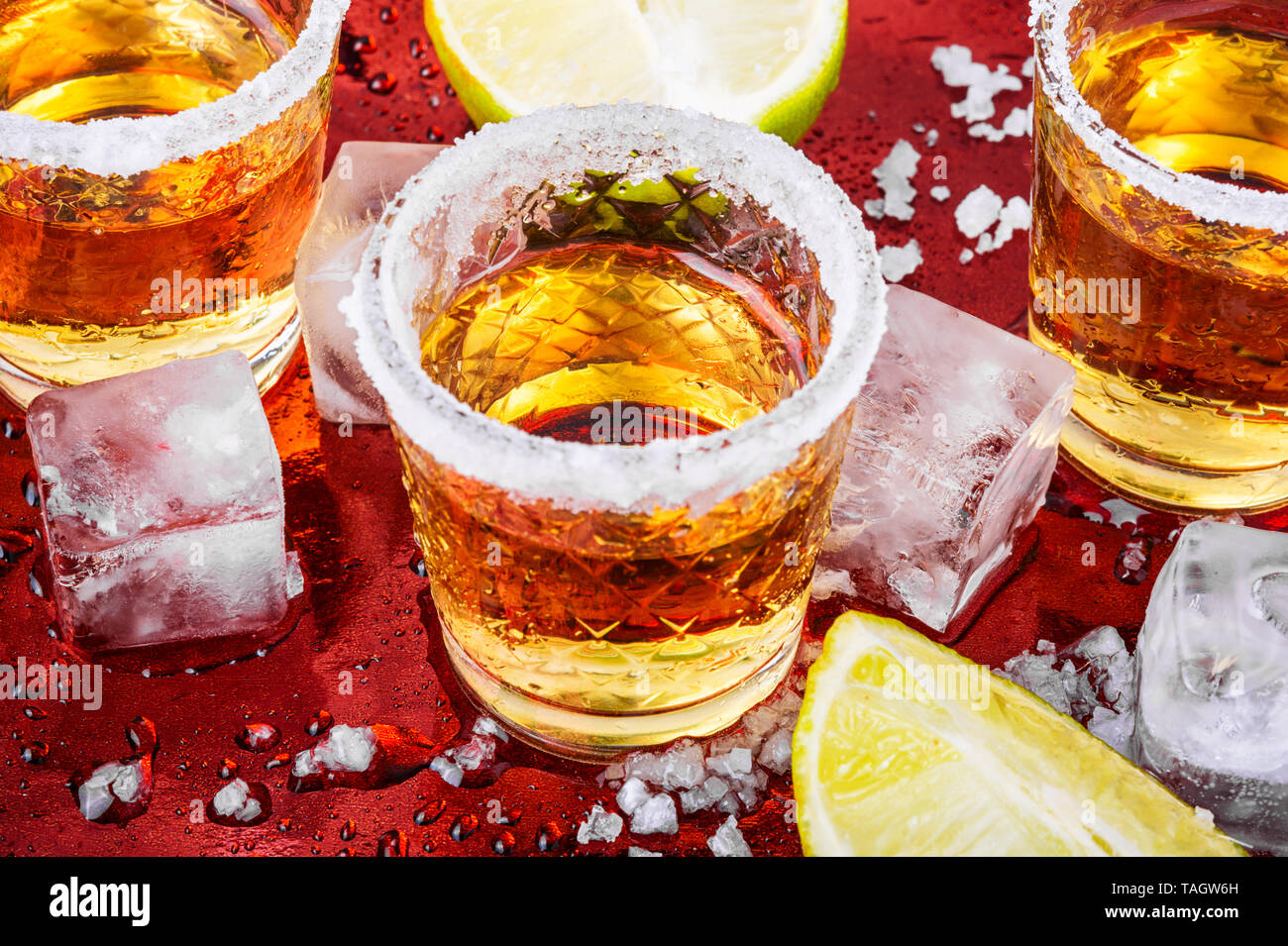 Mexican gold tequila with lime and salt Stock Photo - Alamy