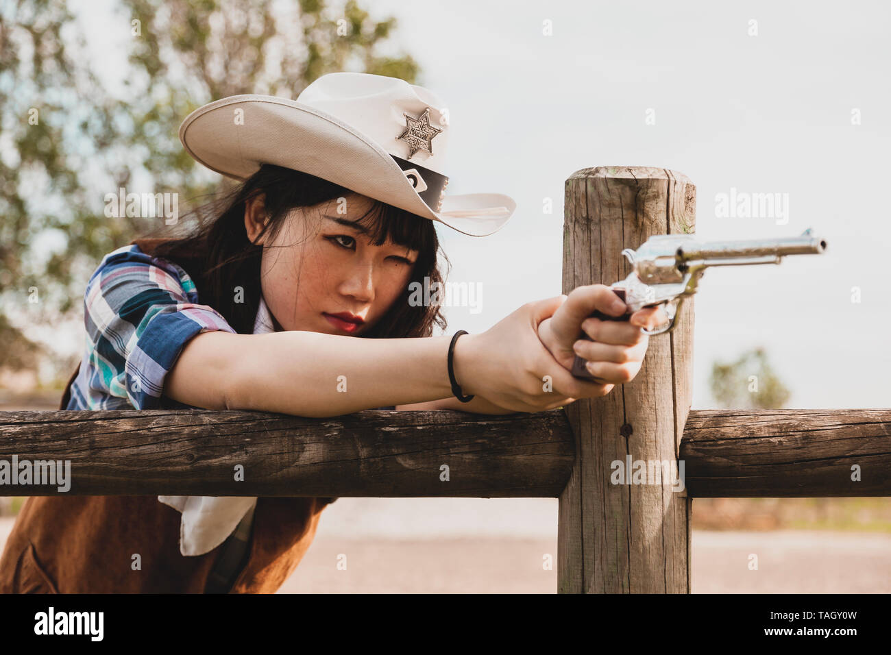 Asian Girl Cowgirl Front View Telegraph