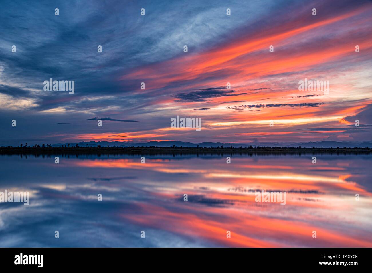 Fire sunrise over calm sea hi-res stock photography and images - Alamy