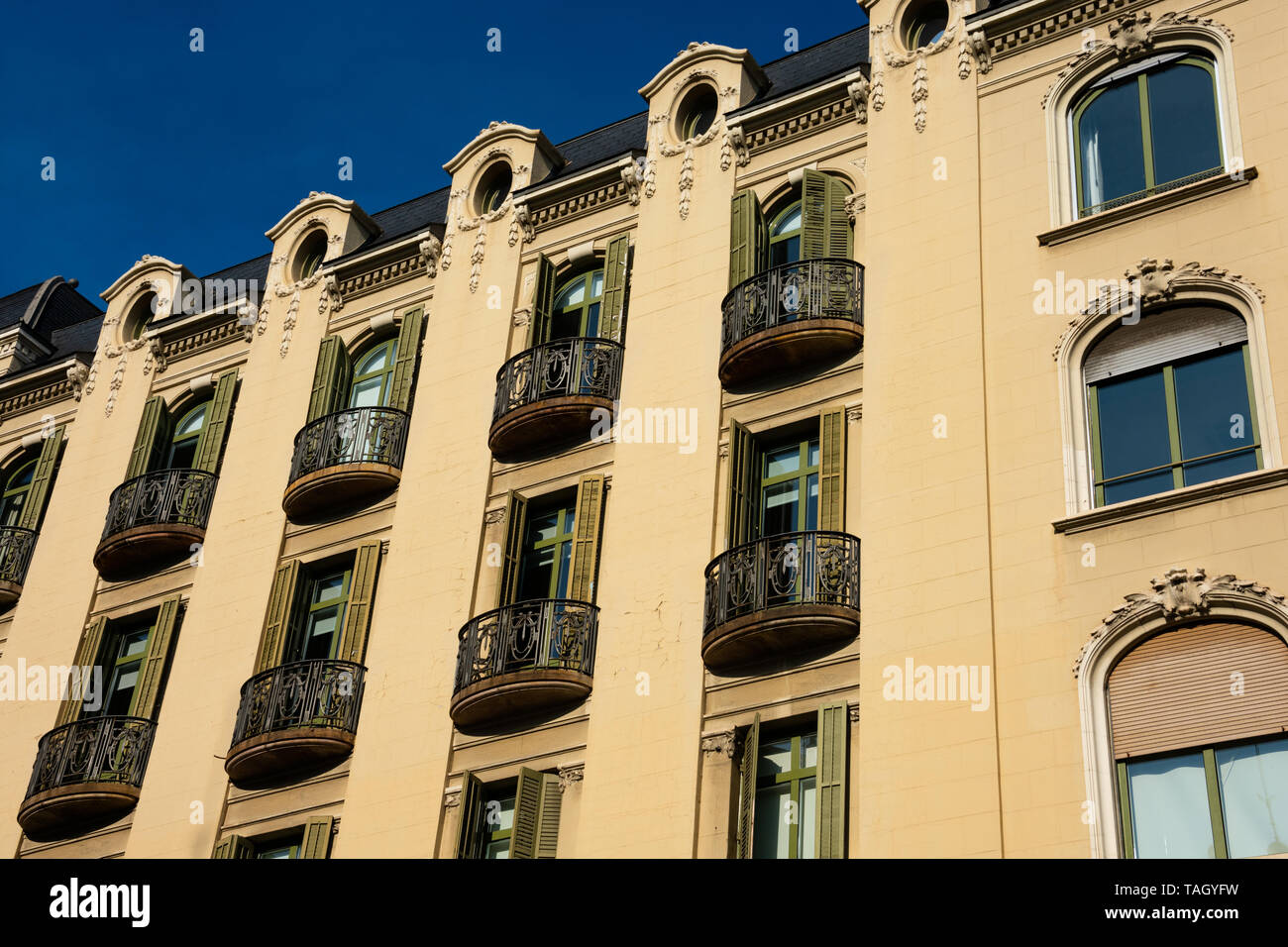 Barcelona, Spain. February 9, 2019. Old building facade and balconies. Diagonal Avenue Stock Photo