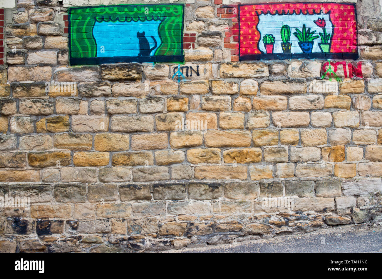 Art on Stone Wall near Westgate Road, Newcastle upon Tyne, England