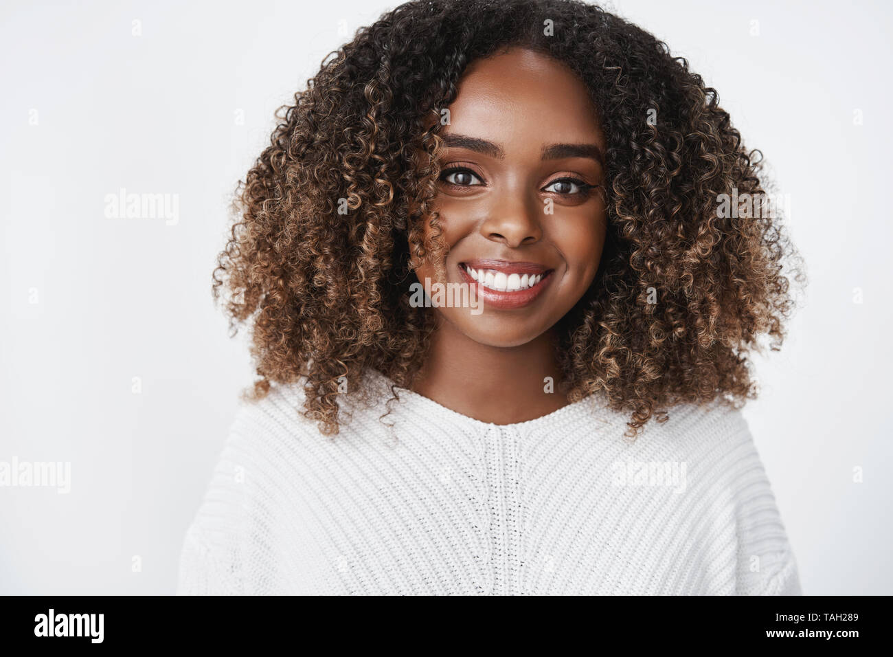 Close Up Shot Of Relaxed And Joyful African American Young