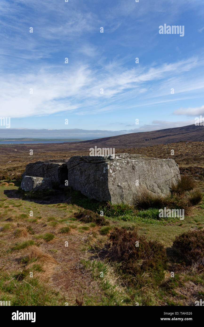 The Dwarfie Stane is a megalithic chambered tomb on the Orkney island of Hoy. Believed to be around 5000 years old. Stock Photo