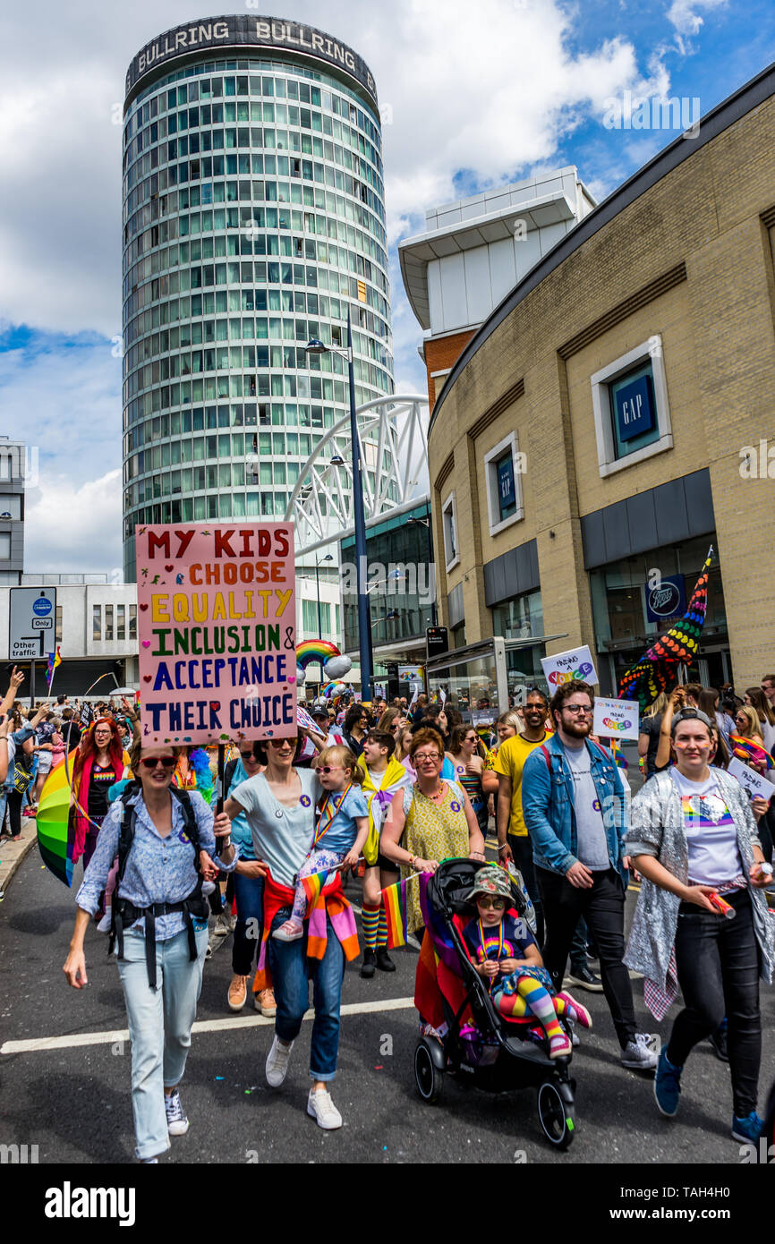 Members of the LGBTQ community are seen during the Birmingham Pride parade. Birmingham Pride this year is endorsing the controversial of No Outsiders educational programme, organisers are hopeful that this year’s event will be the biggest in its 22 year history, with the largest Muslim contingent ever seen at Birmingham Pride, an annual festival for the LGBTQ community usually takes place over the Spring Bank Holiday. The event begins with a parade from Victoria Square in the city centre to the Gay Village in Hurst Street. Stock Photo