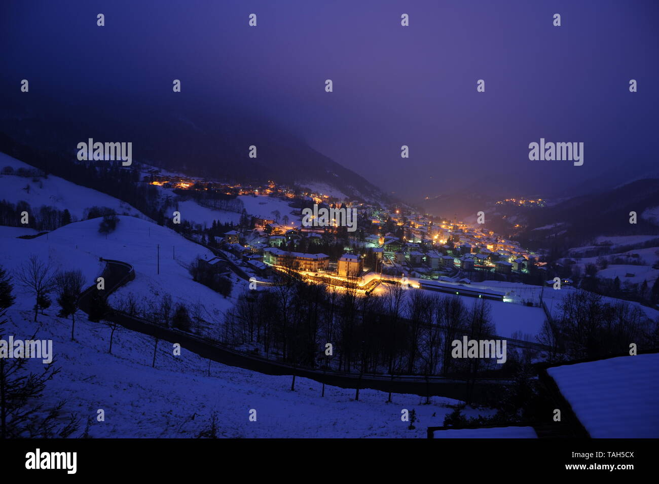 snowy mountain village at night Stock Photo - Alamy