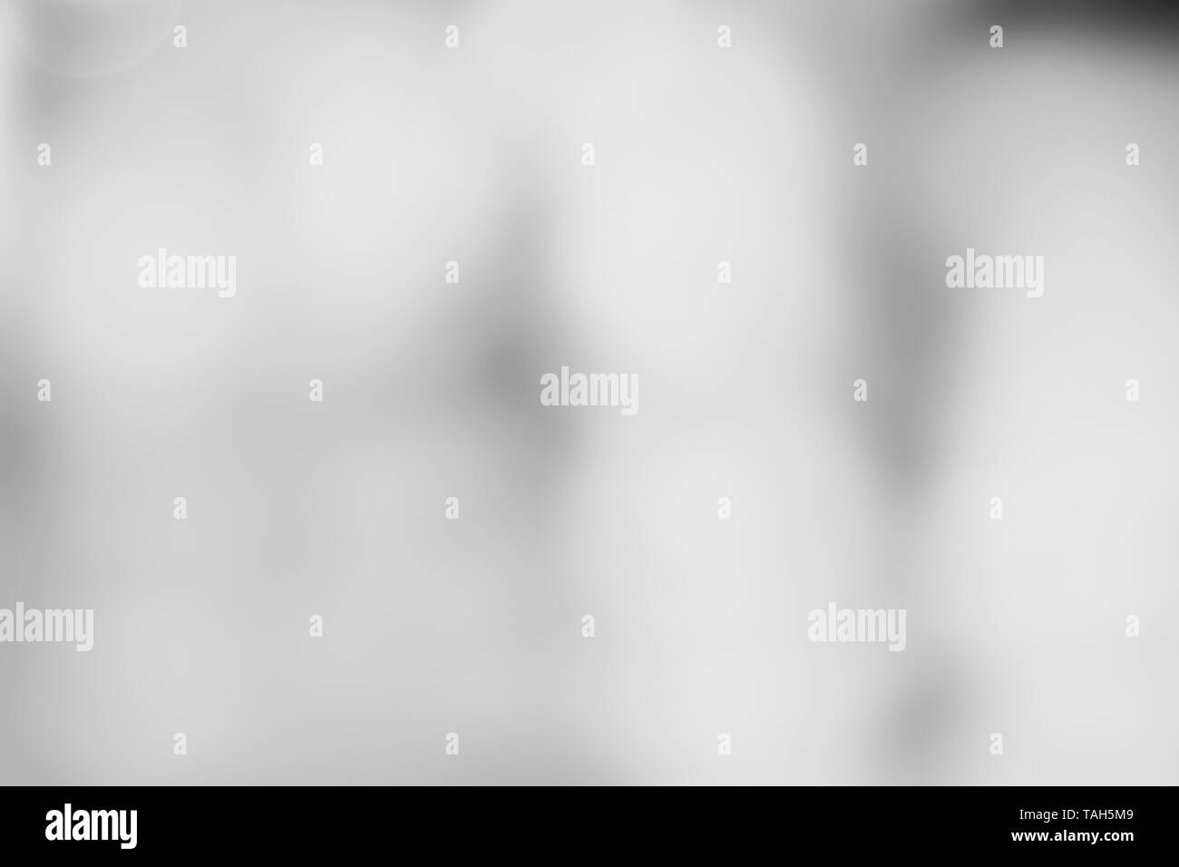 Abstract black and white gradients background for backdrop design, bokeh composition for , website, magazine or graphic for commercial campaign design Stock Photo