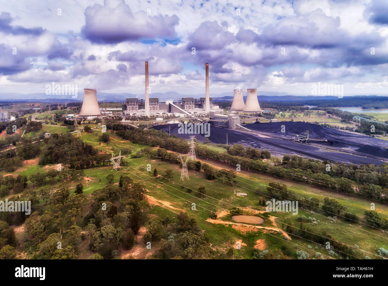 Liddell area of Hunter Valley coal basin with black coal extracted from open cut mines for generation of electricity at Bayswater power station. Stock Photo