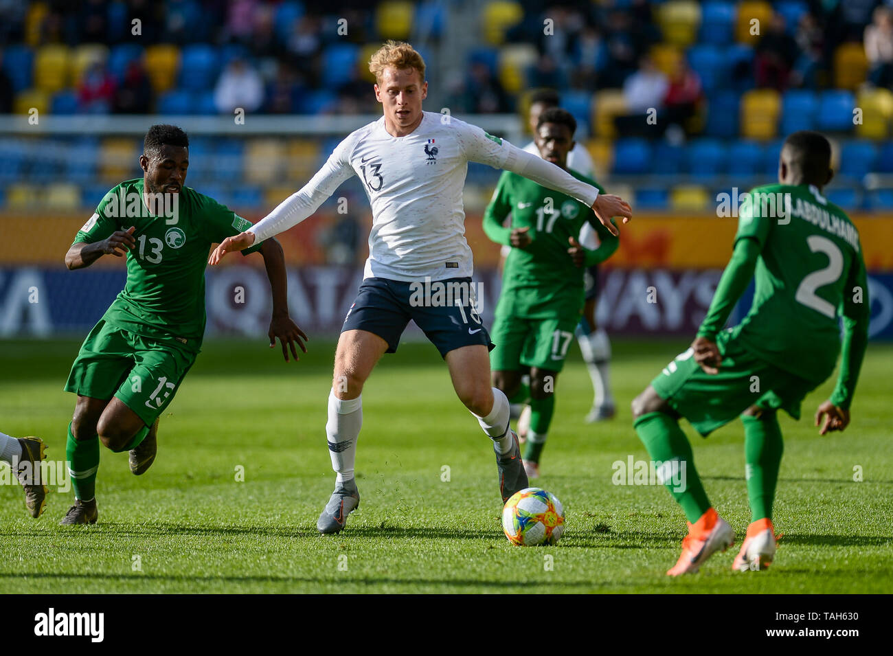 Muhannad Alshanqiti from Saudi Arabia (L) and Nicolas Cozza from France (R) are seen in action during FIFA U-20 World Cup match between France and Saudi Arabia (GROUP E) in Gdynia. ( Final score; France 2:0 Saudi Arabia ) Stock Photo