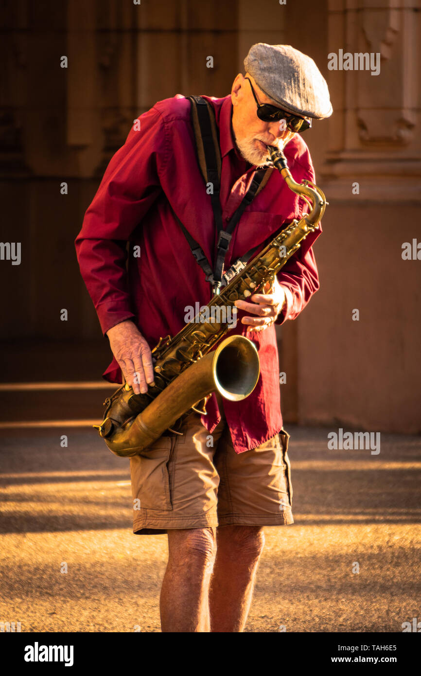 Old Man entertaining people in the park Stock Photo Alamy