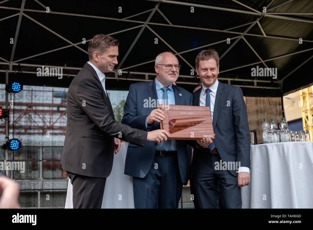 Görlitz, Germany, May 25, 2019 - Martin Dulig, Minister of Transport of Saxony; Carsten Liebig, Plant Manager Bombardier Görlitz and Michael Kretschmer, Prime Minister of Saxony;  (from l.t.r.) on the occasion of the anniversary 170 years wagon construction in Görlitz on 25 May 2019. Stock Photo