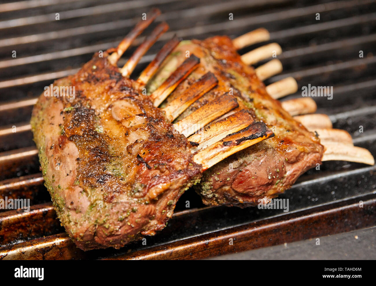 Rack of lamb frying on grill Stock Photo Alamy