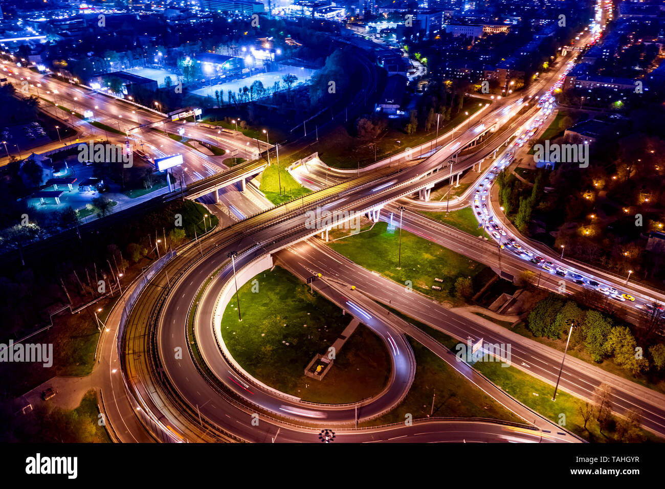 Night Aerial view of a freeway intersection traffic trails in night Moscow Stock Photo