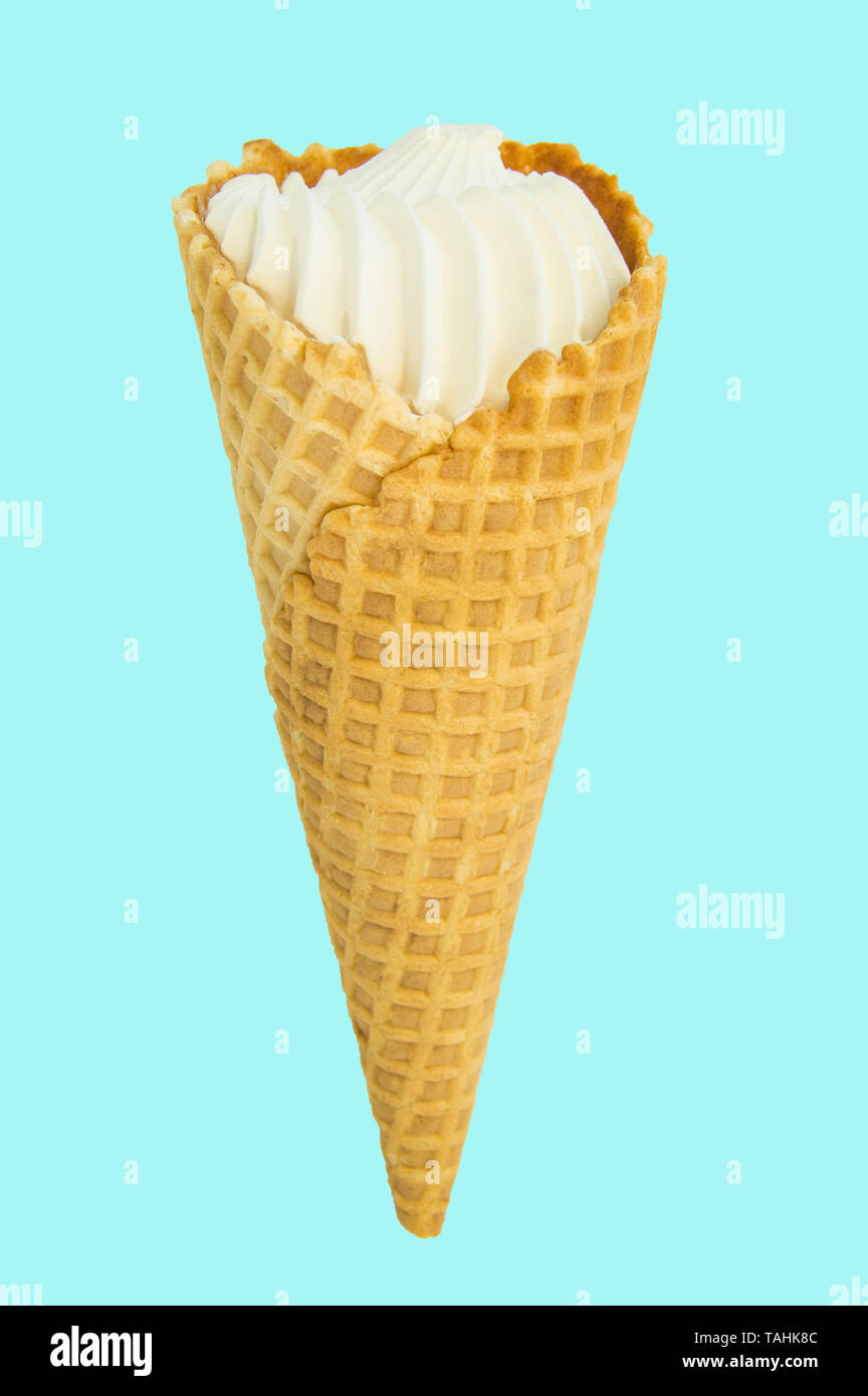 Vanilla ice cream in waffle conVanilla ice cream in waffle cone ...