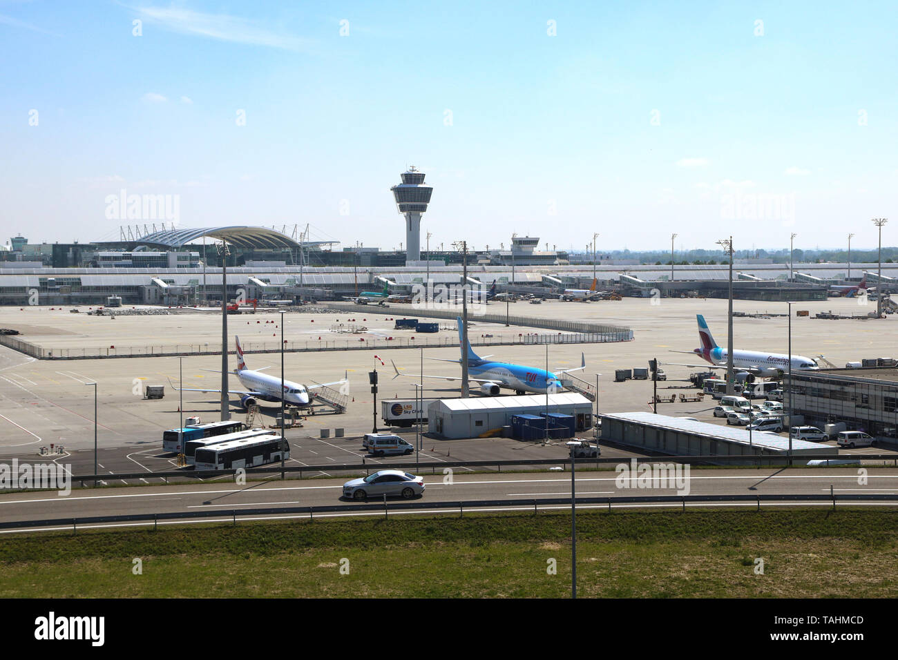 MUNICH, GERMANY - MAY 19, 2019  panoramic view of Munich international airport with the control tower and the runways to refuel the aircrafts Stock Photo