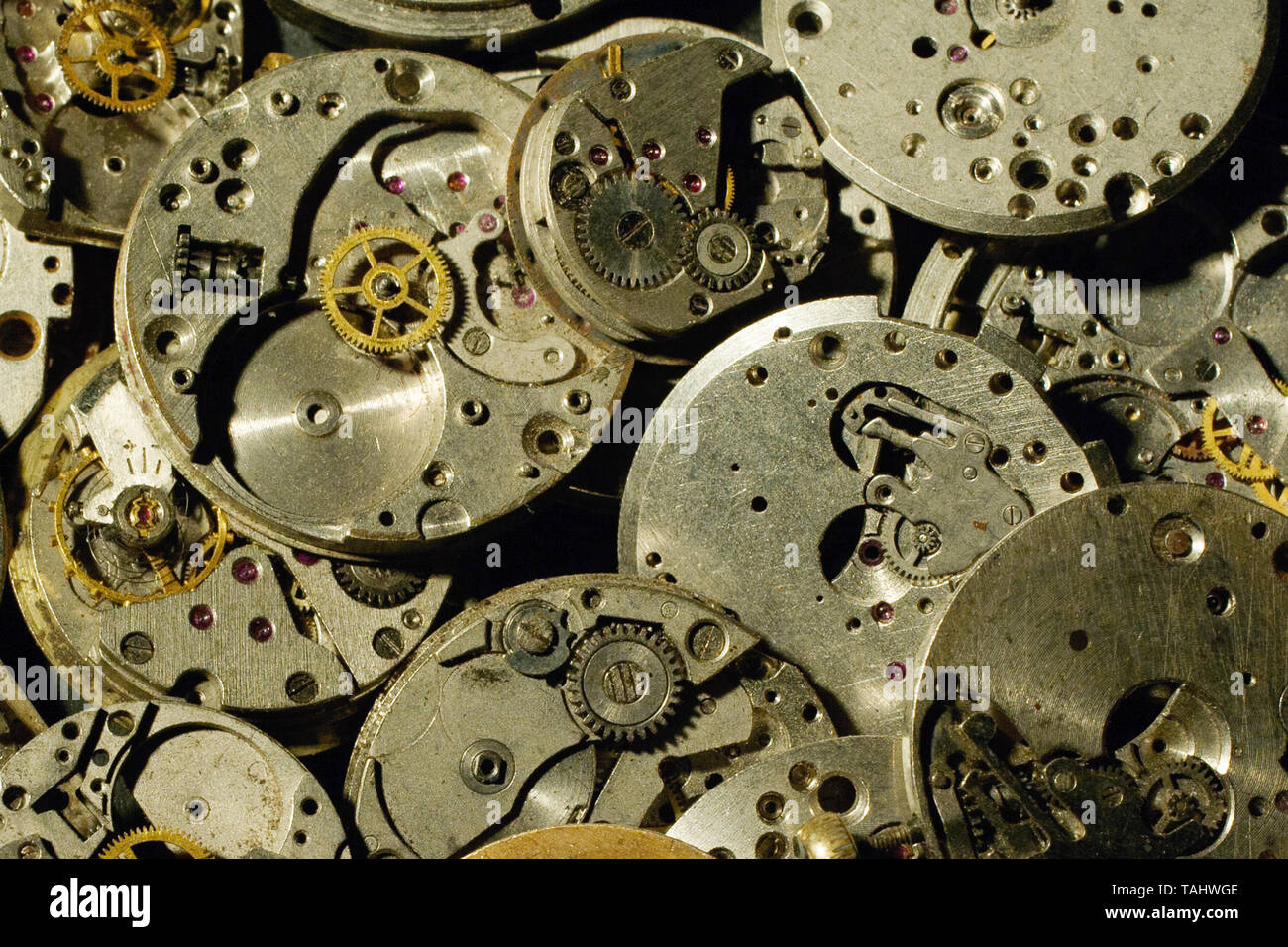 Broken movement of an old pocket watches background Stock Photo Alamy