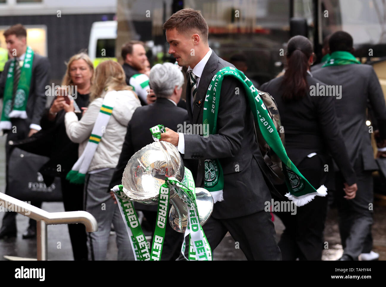 Celtic's Mikael Lustig carries the William Hill Scottish Cup during the trophy parade through Glasgow. Stock Photo