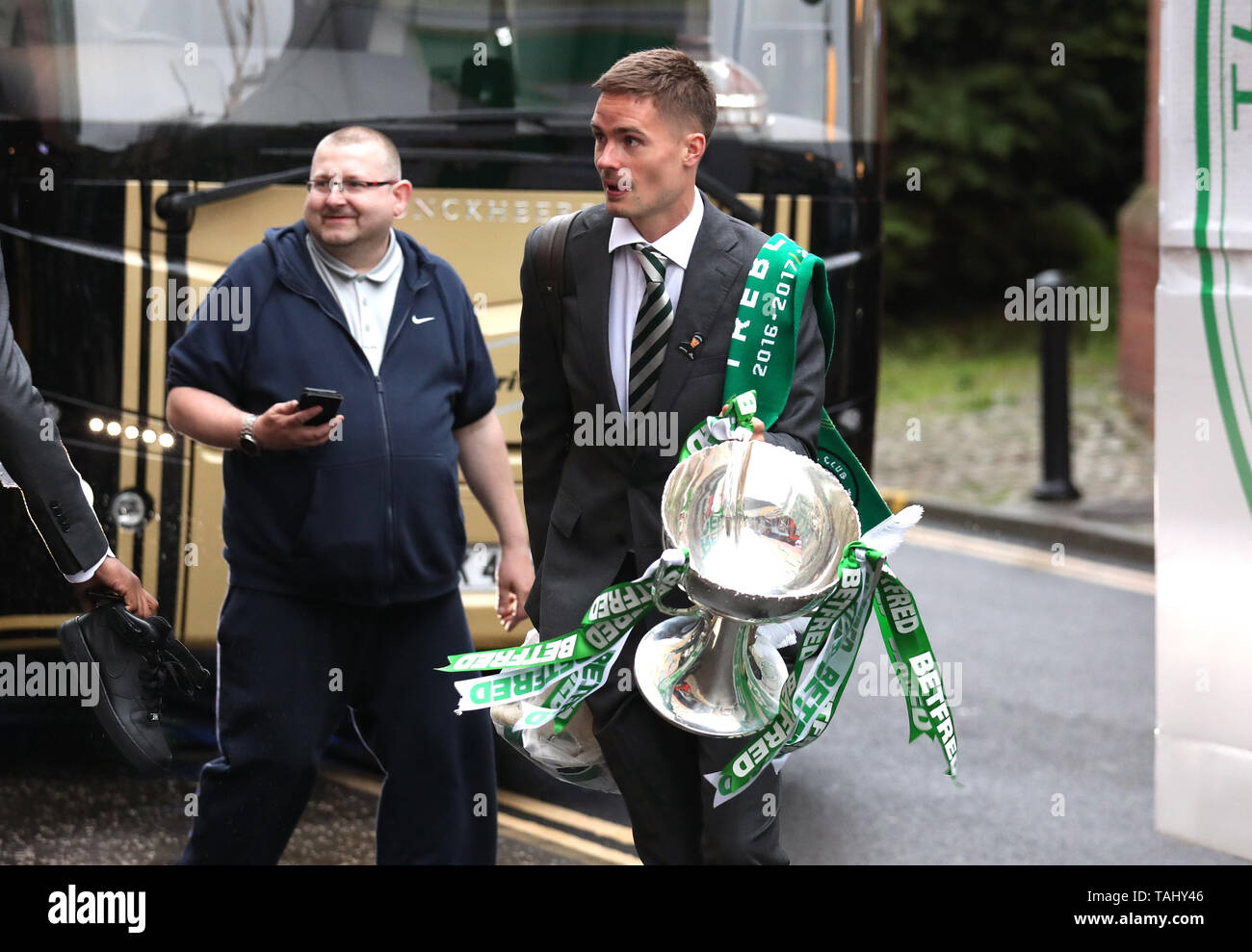 Celtic's Mikael Lustig carries the William Hill Scottish Cup during the trophy parade through Glasgow. Stock Photo