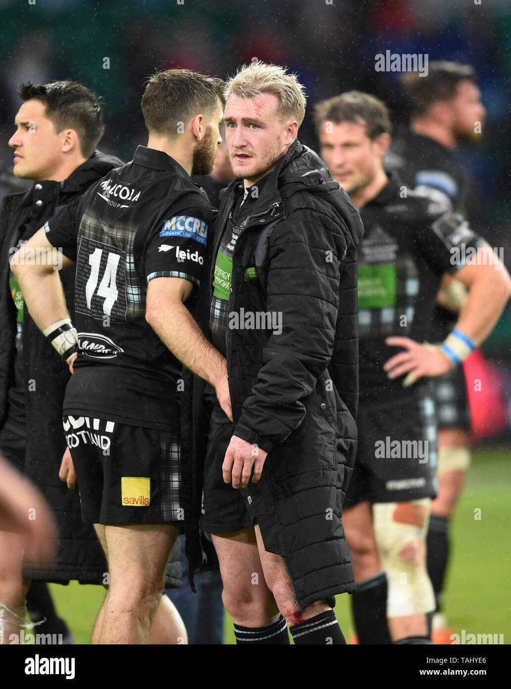 Glasgow's Stuart Hogg with Glasgow's Tommy Seymour (14) after the final whistle during the Guinness PRO14 Final at Celtic Park, Glasgow. Stock Photo