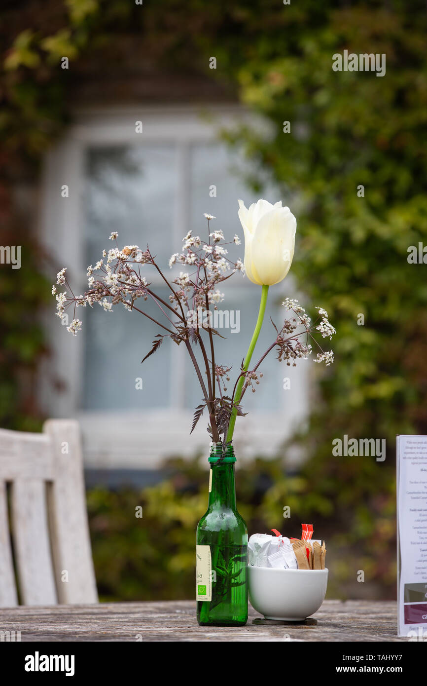 floral table display in cafe Stock Photo