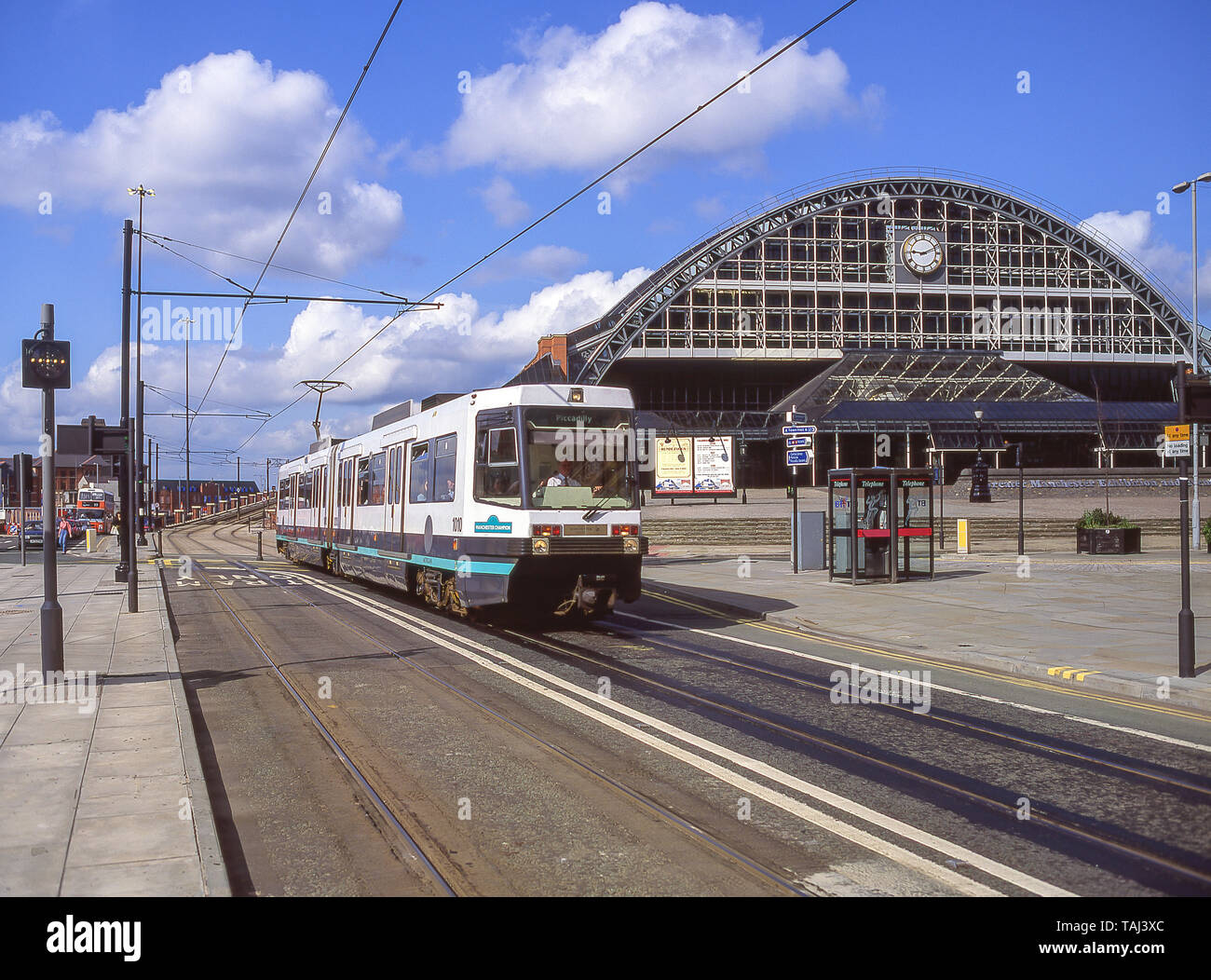 Manchester Metrolink tram and Manchester Central Convention Complex, Windmill Street, Manchester, Greater Manchester, England, United Kingdom Stock Photo